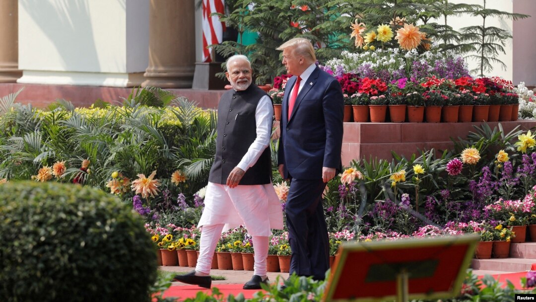 FILE PHOTO: FILE PHOTO: U.S. President Donald Trump and India's Prime Minister Narendra Modi arrive for their joint news conference at Hyderabad House in New Delhi