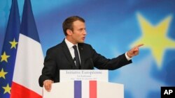 French President Emmanuel Macron delivers a speech on the European Union at the amphitheater of the Sorbonne university in Paris, France, Sept. 26, 2017.