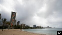 Waikiki Beach is deserted as residents take shelter before the arrival of Hurricane Douglas, in Honolulu, Hawaii, July 26, 2020.