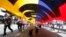 Colombians walk down Central Avenue in Bogota during a nationwide march for the country's peace and for victims of war, April 9, 2013.