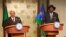 South Sudan President Salva Kiir (R) and his Sudan counterpart Omar al-Bashir hold a joint news briefing in the state house in capital Juba January 6, 2014. 