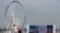 This photo taken May 20, 2014 shows the Capital Wheel, a new Ferris wheel overlooking Washington D.C. at National Harbor in Oxon Hill, Maryland. 