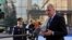 FILE - EU Migration Commissioner Dimitris Avramopoulos answers reporters' questions as he arrives for a meeting of interior ministers of the central Mediterranean contact group on migration in Rome, Italy, March 20, 2017.