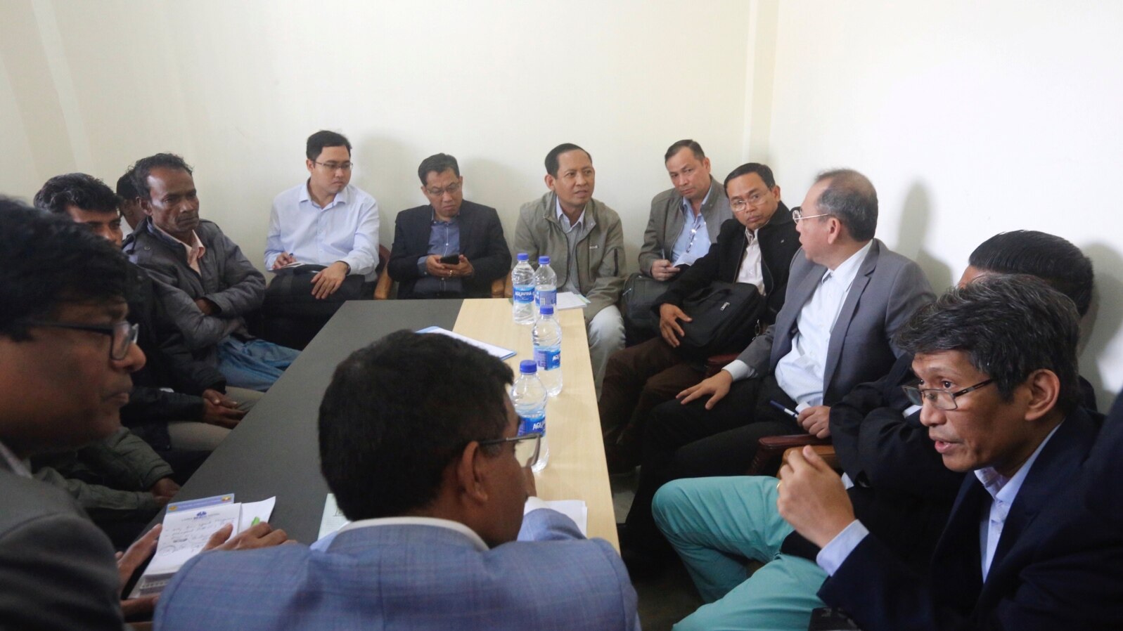 FILE - Myanmar delegates meet with Rohingyas at Kutupalong camp in Cox’s Bazar, Bangladesh, Dec. 19, 2019. 