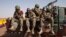 Malian soldiers heading to Gao in a pickup truck arrive in the recently liberated town of Douentza, January 30, 2013. 