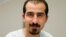 FILE - Bassel Khartabil, taken from the street in Damascus in March 2012 amid a wave of military arrests, has been executed in prison, his widow says.