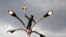 A supporter of deposed Egyptian President Mohamed Morsi holds up his photo while standing at the top of lamp post during a march in Sana'a, Yemen, to show solidarity with his supporters in Egypt.