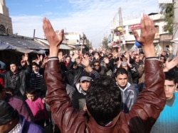 Protesters are seen at an anti-government demonstration in Saraqib, Syria, Dec. 29, 2012. (Courtesy photo)