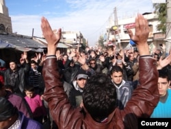 Protesters are seen at an anti-government demonstration in Saraqib, Syria, Dec. 29, 2012. (Courtesy photo)