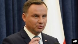 Polish President Andrzej Duda makes a statement in Warsaw, Poland, July 24, 2017. Duda announced that he will veto two contentious bills widely seen as assaults on the independence of the judicial system.