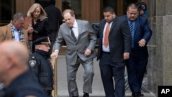 Harvey Weinstein, center, leaves court following a bail hearing, Dec. 6, 2019 in New York. 