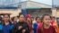 FILE: Garment workers leave their work at the factory in an outskirts of Phnom Penh, Cambodia, May 25, 2017. (Khan Sokummono/VOA Khmer) 