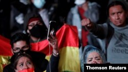 Manifestantes participan en una protesta contra el presidente electo de Bolivia, Luis Arce, alegando un supuesto fraude en las elecciones generales, en La Paz, miércoles 21 de octubre de 2020. [Foto: Reuters]