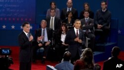 President Obama, right, and former Massachusetts Gov. Romney, participate in the second presidential debate at Hofstra University in Hempstead, N.Y., October 16, 2012. 