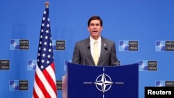U.S. Secretary of Defense Mark Esper speaks at a news conference following a NATO defense ministers meeting at the Alliance headquarters in Brussels, Belgium, Feb. 13, 2020.