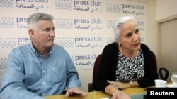 FILE - Debra, right, and Marc Tice, parents of Austin Tice, a journalist who has been missing in Syria since August this year, answer questions from journalists at the Press Club in Beirut, Nov. 12, 2012.