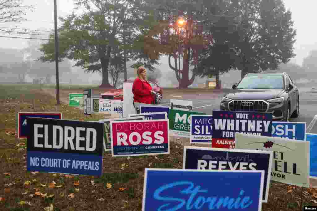 A woman walks outside a polling station on the day of the 2024 U.S. presidential election in Raleigh, North Carolina, Nov. 5, 2024.