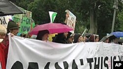 Environmentalists protest the Gulf of Mexico oil spill in front of the White House