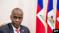 FILE - President Jovenel Moise sits at the Presidential Palace during an interview in Port-au-Prince, Oct. 22, 2019.