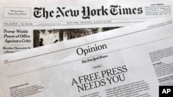 An editorial titled "A Free Press Needs You" is published in The New York Times, Thursday, Aug. 16, 2018, in New York. Newspapers from Maine to Hawaii pushed back against President Donald Trump's attacks on "fake news" Thursday with a coordinated series of editorials speaking up for a free and vigorous press. The Boston Globe, which set the campaign in motion by urging the unified voice, had estimated that some 350 newspapers would participate. (AP Photo/Mark Lennihan)