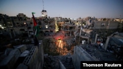 Rumah-rumah yang rusak akibat serangan udara Israel selama pertempuran Israel-Hamas di Gaza. (Foto: Reuters)