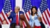 Presiden AS terpilih Donald Trump (kiri) tampak berjoget ditemani oleh mantan anggota DPR AS Tulsi Gabbard dalam acara kampanye di La Crosse, Wisconsin, pada 29 Agustus 2024. (Foto: AFP/Kamil Krzaczynski)