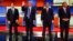 FILE - Republican presidential candidates, Sen. Marco Rubio, businessman Donald Trump, Sen. Ted Cruz, and Ohio Gov. John Kasich take the stage before a Republican presidential primary debate at Fox Theatre in Detroit, March 3, 2016.