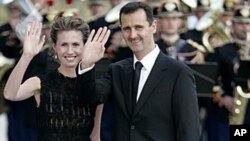 ປະທານາທິບໍດີຊີເຣຍ ທ່ານ Bashar al-Assad ແລະພັນລະຍາ ຍານາງ Asma (13 ກໍລະກົດ 2008)