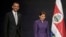 President Barack Obama and Costa Rica President Laura Chinchilla arrive for their joint news conference at the National Center for Art and Culture in San Jose, Costa Rica, May 3, 2013. 