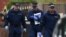 FILE - Police officers arrive at a residential property on Elsmore Road in Fallowfield, Manchester, on May 24, 2017, as investigations continue into the May 22 terror attack at the Manchester Arena.