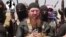 FILE - Islamic State commander Omar al-Shishani (C), aka Omar the Chechen, is seen in an image made from undated video posted June 28, 2014, on a social media account frequently used for communications by the jihadist group.