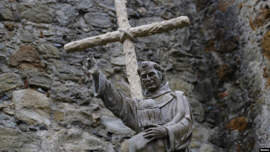 A statue of Father Junipero Serra stands at Mission San Juan Capistrano in California. Pope Francis will confer sainthood on the controversial 18th century Spanish missionary during his visit to Washington, Sept. 23, 2015.