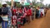 People queue as they wait to cast their votes in the Kenya election in Gatundu in Kiambu county, Kenya, Aug. 8, 2017.