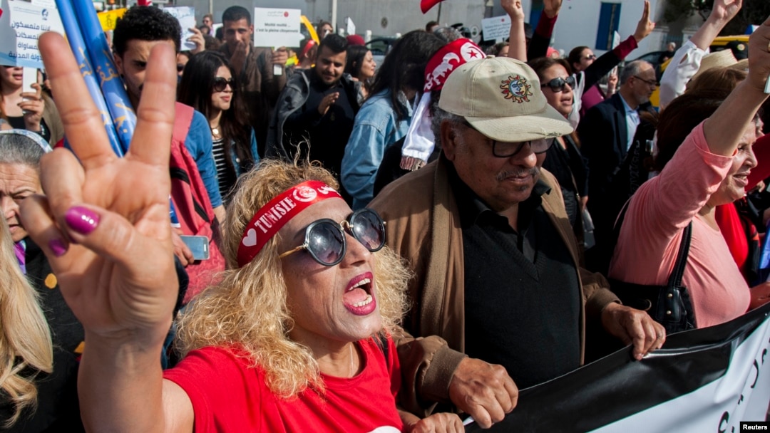 Tunisian demonstrators shout during a protest seeking equality between men and women in Tunis, Tunisia, March 10, 2018.
