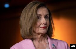 House Speaker Nancy Pelosi, D-Calif., leads other House Democrats to discuss H.R. 1, the For the People Act, which passed in the House but is being held up in the Senate, at the Capitol in Washington, Sept. 27, 2019.