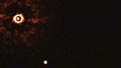 Scientists Get First Image of Planets Orbiting Sun-like Star