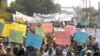 FILE - Pakistani women stage a rally to protest against domestic violence and sexual harassment as well as to demand greater economic opportunities. 