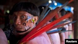 Yanomami Indians from two different villages meet in Novo Demini on the border between the states of Amazonas and Roraima, Oct. 15, 2012.