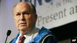 Alaska Gov. Bill Walker announces he will drop his re-election bid while addressing the Alaska Federation of Natives conference, Oct. 19, 2018, in Anchorage, Alaska. Walker's re-election plans were dealt a blow earlier in the week after his running mate, Lt. Gov. Byron Mallott, resigned after making an inappropriate overture toward a woman.