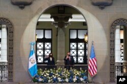 Vice President Kamala Harris and Guatemalan President Alejandro Giammattei pose for an official photograph, June 7, 2021, at the National Palace in Guatemala City.