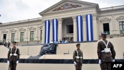 Salvadoran soldiers take part in a rehearsal during preparations for the presidential inauguration ceremony in downtown San Salvador, May 29, 2019.