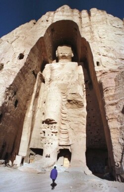 FILE - A 55-meter-high (180 feet) Buddha statue in Bamiyan town in central Afghanistan is shown on Dec. 22, 1997 before its destruction.