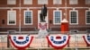 A statue of George Washington is displayed along the route of a parade in Philadelphia, Pennsylvania.