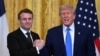 US President Donald Trump and French President Emmanuel Macron shake hands at the end of a joint press conference in the East Room to the White House in Washington, DC, on February 24, 2025. (Photo by ROBERTO SCHMIDT / AFP)