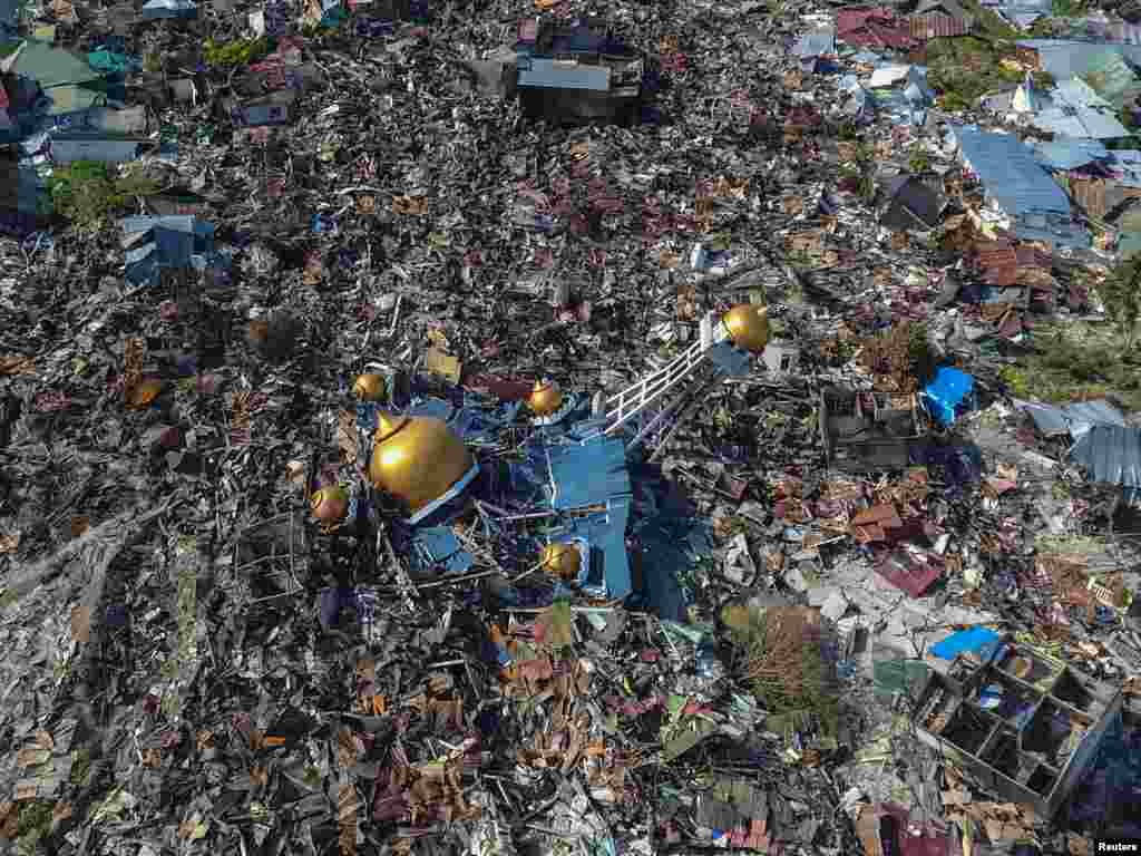 An aerial view of an area devastated by an earthquake in Palu, Central Sulawesi, Indonesia, in this photo taken by Antara Foto.
