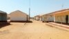 People walk at the Government Science secondary school in Kankara district, after it was attacked by armed bandits, in northwestern Katsina state, Nigeria, Dec. 12, 2020.