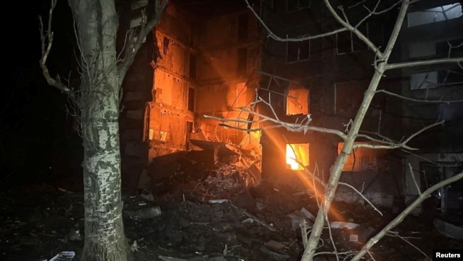 An apartment building damaged in the aftermath of an attack, amid Russia's attack on Ukraine, in a location given as Selydove, Donetsk region, Ukraine, in this still image released on Feb. 14, 2024. (Vadym Filashkin via Telegram/Handout via REUTERS).