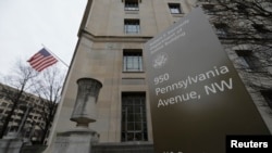 FILE - A general view of the Department of Justice building is seen in Washington, Feb 1, 2018.