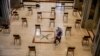 A woman cleans SS. Quirico and Giulitta Church in Giussano, Italy. Churches in Italy are preparing to reopen to the public for masses after Italy partially lifted restrictions following a two-month lockdown due to COVID-19.