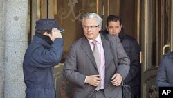 Baltazar Garzon, once widely regarded as Spain's most prominent magistrate, leaves the Supreme Court in Madrid, January 17, 2012.